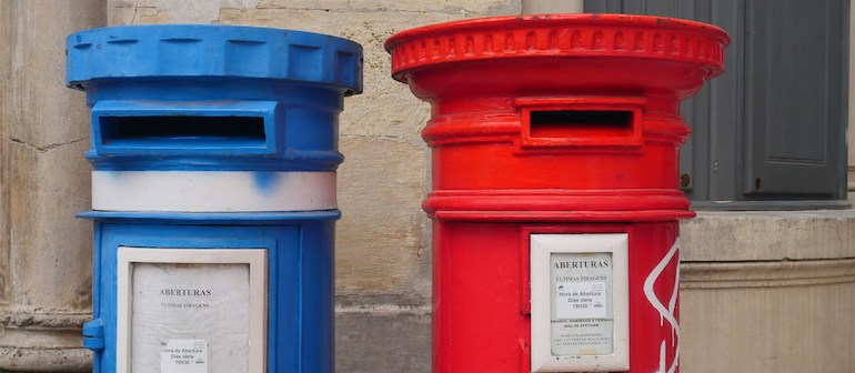 two postboxes, blue and red